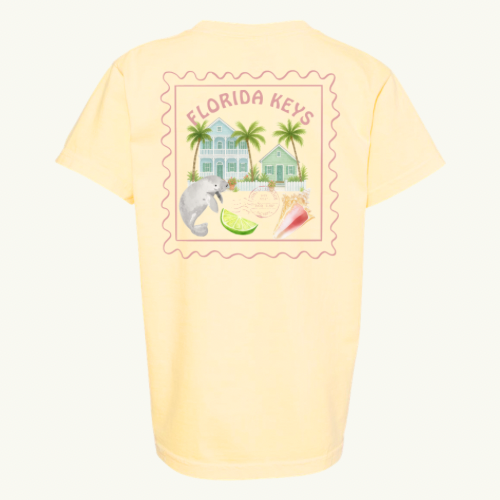 Yellow t-shirt with Florida Keys graphic featuring a manatee, limes, and houses.