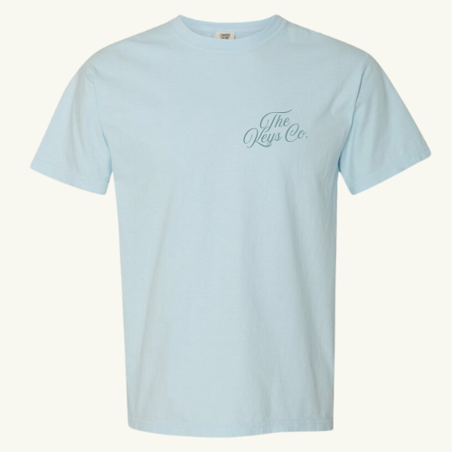 Light blue t-shirt with 'The Keys Co' logo on a white background